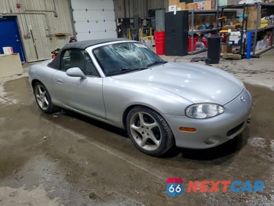 Czwarte zdjęcie samochodu z boku: 2003 MAZDA MX-5 MIATA BASE VIN:JM1NB353X30304462 - miniatura