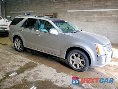 Czwarte zdjęcie samochodu z boku: 2004 CADILLAC SRX VIN:1GYEE63A350123095 - miniatura