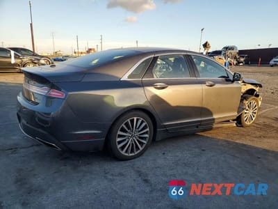 Trzecie zdjęcie samochodu z tyłu: 2017 LINCOLN MKZ PREMIERE VIN:3LN6L5B91HR630210 - miniatura