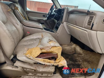 Zdjęcie 7 z 13 samochodu: 2003 CHEVROLET SUBURBAN C1500 VIN:1GNEC16Z13J181673 - miniatura