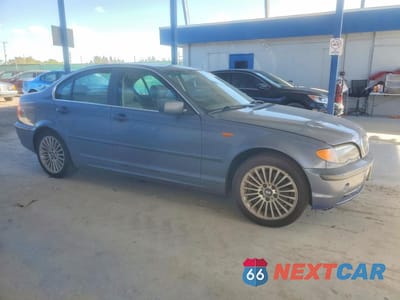 Czwarte zdjęcie samochodu z boku: 2002 BMW 330 XI VIN:WBAEW53412PG18227 - miniatura