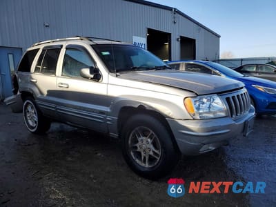 Czwarte zdjęcie samochodu z boku: 2000 JEEP GRAND CHEROKEE LIMITED VIN:1J4GW58N2YC296606 - miniatura