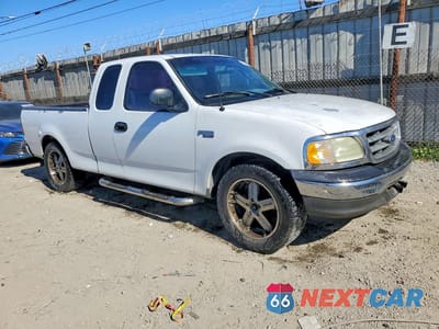 Czwarte zdjęcie samochodu z boku: 2003 FORD F150 VIN:1FTRX17223NB92206 - miniatura