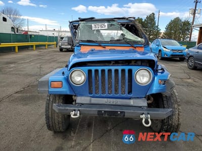 Piąte zdjęcie samochodu w środku: 1999 JEEP WRANGLER / TJ SE VIN:1J4FY29P2XP481430 - miniatura