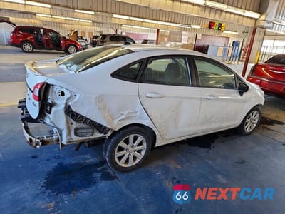 Trzecie zdjęcie samochodu z tyłu: 2013 FORD FIESTA SE VIN:3FADP4BJ2DM173280 - miniatura