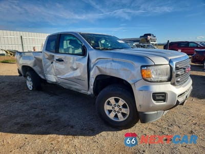 Czwarte zdjęcie samochodu z boku: 2018 GMC CANYON VIN:1GTH5BEA0J1218162 - miniatura