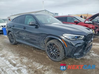 Czwarte zdjęcie samochodu z boku: 2020 BMW X6 M VIN:5YMCY0C0XL9D21538 - miniatura