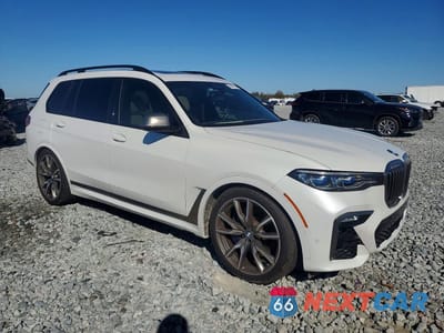 Czwarte zdjęcie samochodu z boku: 2022 BMW X7 M50I VIN:5UXCX6C02N9L77440 - miniatura