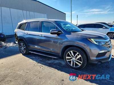 Czwarte zdjęcie samochodu z boku: 2017 HONDA PILOT ELITE VIN:5FNYF6H00HB000439 - miniatura