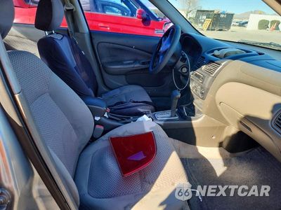 Zdjęcie 13 z 13 samochodu: 2004 NISSAN SENTRA 1.8 VIN:3N1CB51D34L477023 - miniatura