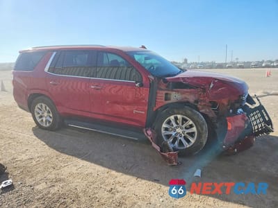 Czwarte zdjęcie samochodu z boku: 2024 CHEVROLET TAHOE K1500 PREMIER VIN:1GNSKSKD6RR413877 - miniatura