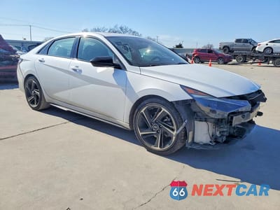 Czwarte zdjęcie samochodu z boku: 2022 HYUNDAI ELANTRA N LINE VIN:KMHLR4AF1NU235614 - miniatura