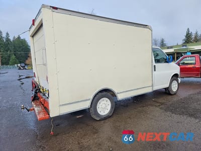 Trzecie zdjęcie samochodu z tyłu: 2001 GMC SAVANA PASSENGER 350 VIN:1GDHG31R311223685 - miniatura