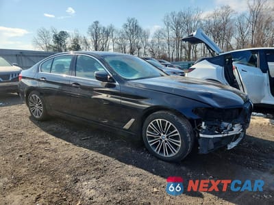 Czwarte zdjęcie samochodu z boku: 2018 BMW 530 XI VIN:WBAJA7C5XJWA72095 - miniatura