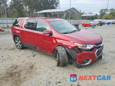 Czwarte zdjęcie samochodu z boku: 2018 CHEVROLET TRAVERSE LT VIN:1GNERHKW1JJ281935 - miniatura