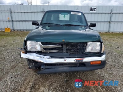 Piąte zdjęcie samochodu w środku: 1999 TOYOTA TACOMA XTRACAB VIN:4TAVN52N7XZ538032 - miniatura