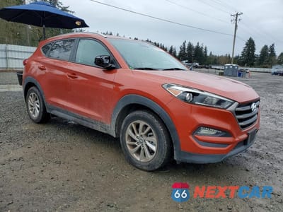 Czwarte zdjęcie samochodu z boku: 2016 HYUNDAI TUCSON SE VIN:KM8J3CA44GU129856 - miniatura