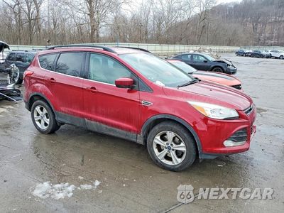 Czwarte zdjęcie samochodu z boku: 2014 FORD ESCAPE SE VIN:1FMCU9GX2EUB94745 - miniatura