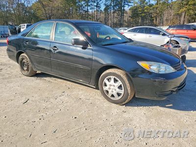 Czwarte zdjęcie samochodu z boku: 2004 TOYOTA CAMRY LE VIN:JTDBE32K140272444 - miniatura