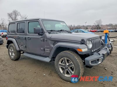Czwarte zdjęcie samochodu z boku: 2018 JEEP WRANGLER UNLIMITED SAHARA VIN:1C4HJXEG0JW144354 - miniatura