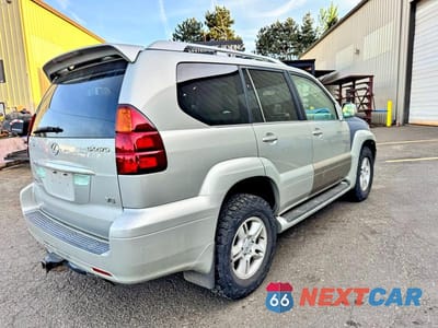 Czwarte zdjęcie samochodu z boku: 2003 LEXUS GX 470 BASE VIN:JTJBT20X130004567 - miniatura