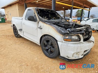 Czwarte zdjęcie samochodu z boku: 2000 FORD F150 SVT LIGHTNING VIN:2FTZF0733YCA81697 - miniatura