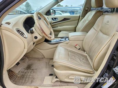 Zdjęcie 7 z 14 samochodu: 2013 INFINITI JX35 VIN:5N1AL0MM8DC318666 - miniatura