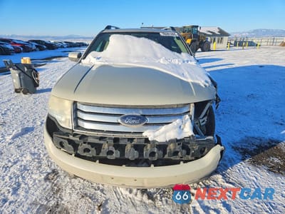 Piąte zdjęcie samochodu w środku: 2008 FORD TAURUS X SEL VIN:1FMDK05W08GA04282 - miniatura