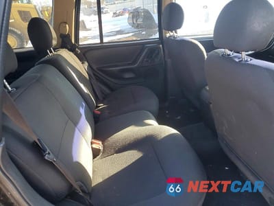 Zdjęcie 11 z 13 samochodu: 2002 JEEP GRAND CHEROKEE LAREDO VIN:1J4GW48S82C178860 - miniatura