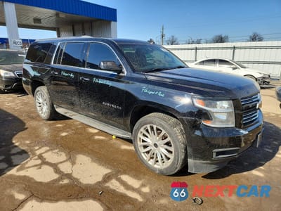 Czwarte zdjęcie samochodu z boku: 2017 CHEVROLET SUBURBAN K1500 LS VIN:1GNSKGKC0HR266880 - miniatura