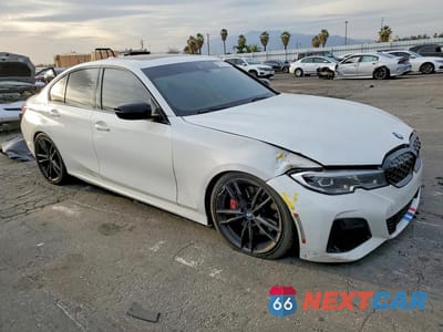 Czwarte zdjęcie samochodu z boku: 2021 BMW M340I VIN:3MW5U7J06M8C07633 - miniatura