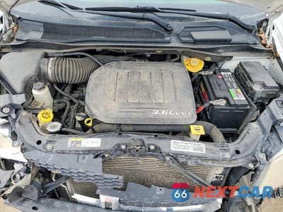 Zdjęcie 12 z 13 samochodu: 2014 DODGE GRAND CARAVAN SE VIN:2C4RDGBG1ER354203 - miniatura