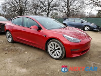 Czwarte zdjęcie samochodu z boku: 2022 TESLA MODEL 3 VIN:5YJ3E1EA7NF192029 - miniatura
