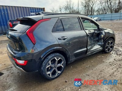 Trzecie zdjęcie samochodu z tyłu: 2024 KIA NIRO EX TOURING VIN:KNDCR3LE0R5142599 - miniatura