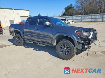 Czwarte zdjęcie samochodu z boku: 2023 TOYOTA TACOMA DOUBLE CAB VIN:3TYCZ5AN3PT140176 - miniatura