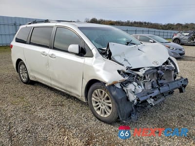Czwarte zdjęcie samochodu z boku: 2016 TOYOTA SIENNA XLE 8-PASSENGER VIN:5TDYK3DC8GS696665 - miniatura