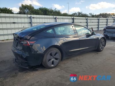 Trzecie zdjęcie samochodu z tyłu: 2022 TESLA MODEL 3 VIN:5YJ3E1EA6NF353535 - miniatura