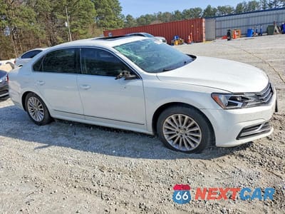 Czwarte zdjęcie samochodu z boku: 2016 VOLKSWAGEN PASSAT SE VIN:1VWBT7A33GC012263 - miniatura