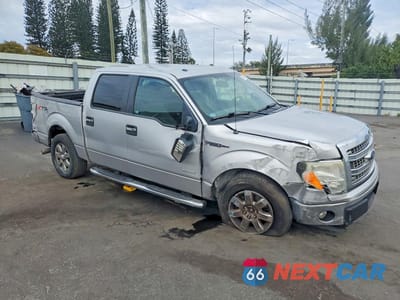 Czwarte zdjęcie samochodu z boku: 2014 FORD F150 SUPERCREW VIN:1FTFW1ET4EKD86905 - miniatura