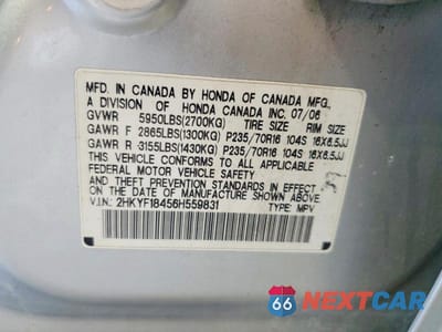 Zdjęcie 13 z 13 samochodu: 2006 HONDA PILOT EX VIN:2HKYF18456H559831 - miniatura