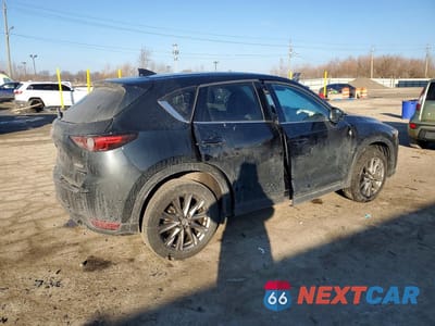 Trzecie zdjęcie samochodu z tyłu: 2021 MAZDA CX-5 GRAND TOURING VIN:JM3KFADM7M0390604 - miniatura