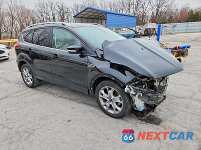 Czwarte zdjęcie samochodu z boku: 2014 FORD ESCAPE TITANIUM VIN:1FMCU0JX4EUD80212 - miniatura