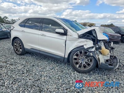 Czwarte zdjęcie samochodu z boku: 2015 FORD EDGE TITANIUM VIN:2FMPK3K85FBB25222 - miniatura