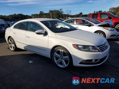 Czwarte zdjęcie samochodu z boku: 2013 VOLKSWAGEN CC SPORT VIN:WVWBP7AN8DE512959 - miniatura