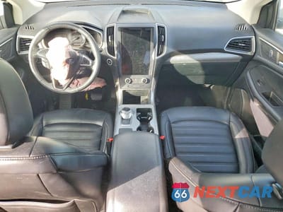 Zdjęcie 8 z 12 samochodu: 2021 FORD EDGE SEL VIN:2FMPK3J92MBA63382 - miniatura