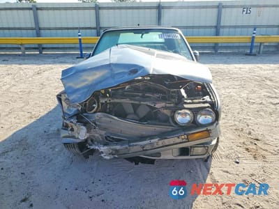 Piąte zdjęcie samochodu w środku: 1991 BMW 318 I VIN:WBABA7317MEJ11315 - miniatura