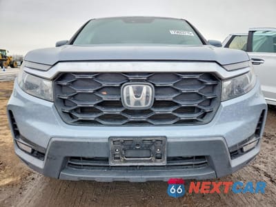 Piąte zdjęcie samochodu w środku: 2023 HONDA PASSPORT EXL VIN:5FNYF8H52PB003221 - miniatura