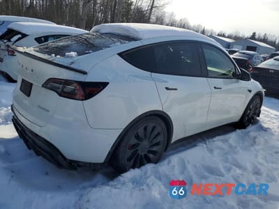 Trzecie zdjęcie samochodu z tyłu: 2022 TESLA MODEL Y VIN:7SAYGDEF4NF318699 - miniatura