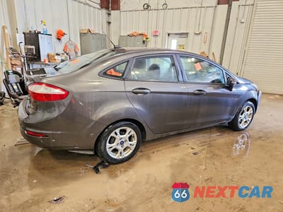 Trzecie zdjęcie samochodu z tyłu: 2015 FORD FIESTA SE VIN:3FADP4BJ6FM145176 - miniatura
