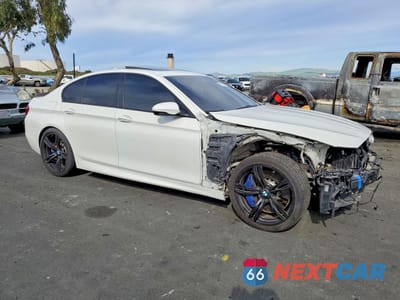 Czwarte zdjęcie samochodu z boku: 2013 BMW Motorrad M5 VIN:WBSFV9C58DC773304 - miniatura